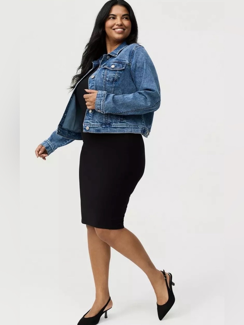 light-wash Torrid denim jacket with a classic button-down front.